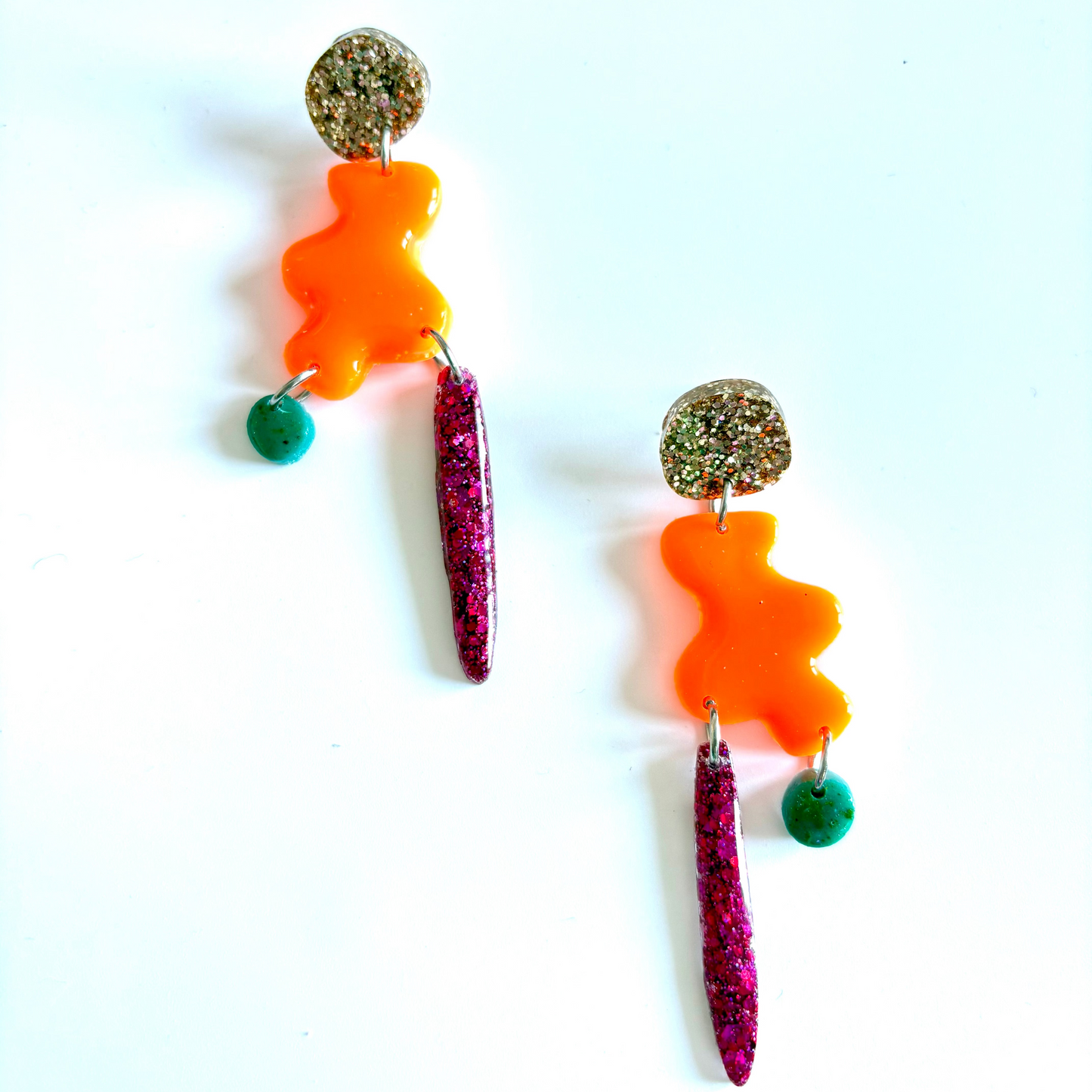 boucle oreilles en resine